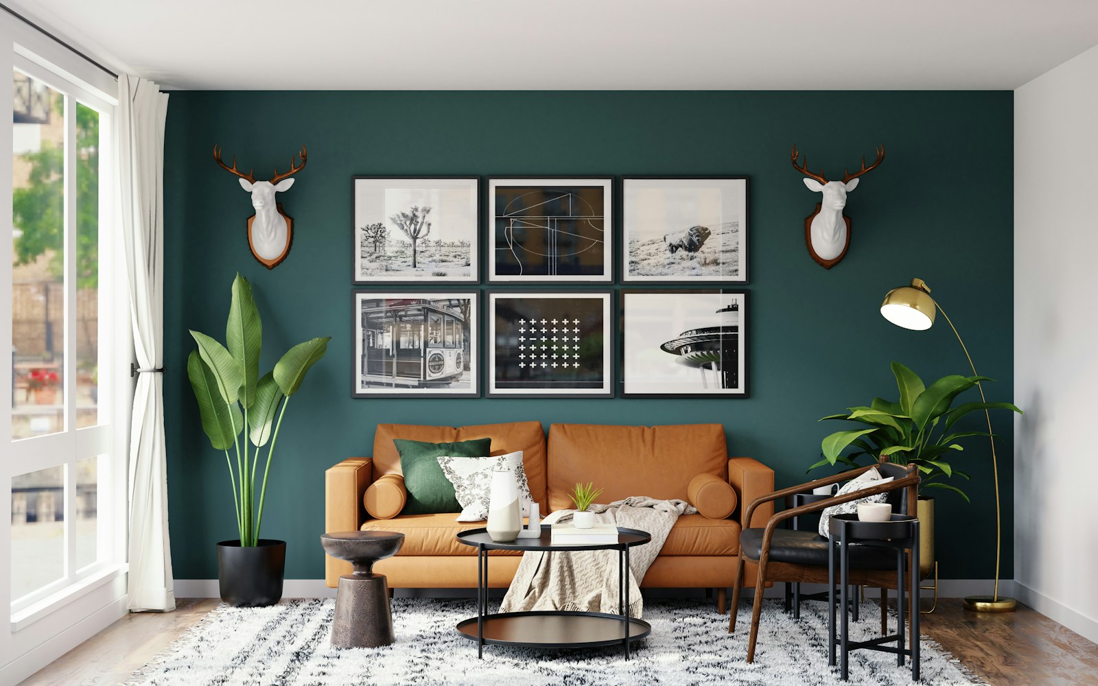 Living room with deep green feature wall and tan leather sofa