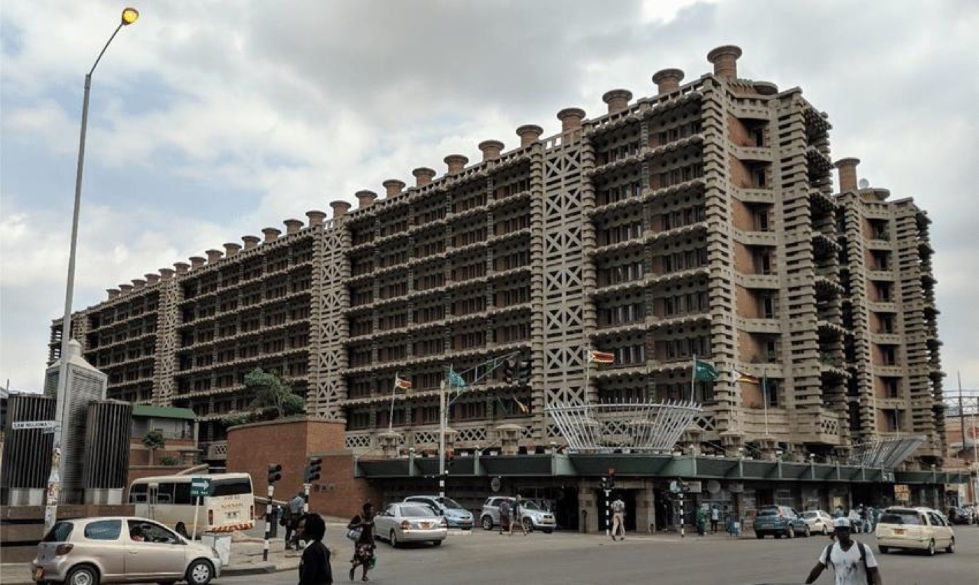 The Eastgate Centre in Harare, its facade broken up by deep shading and rooftop chimneys
