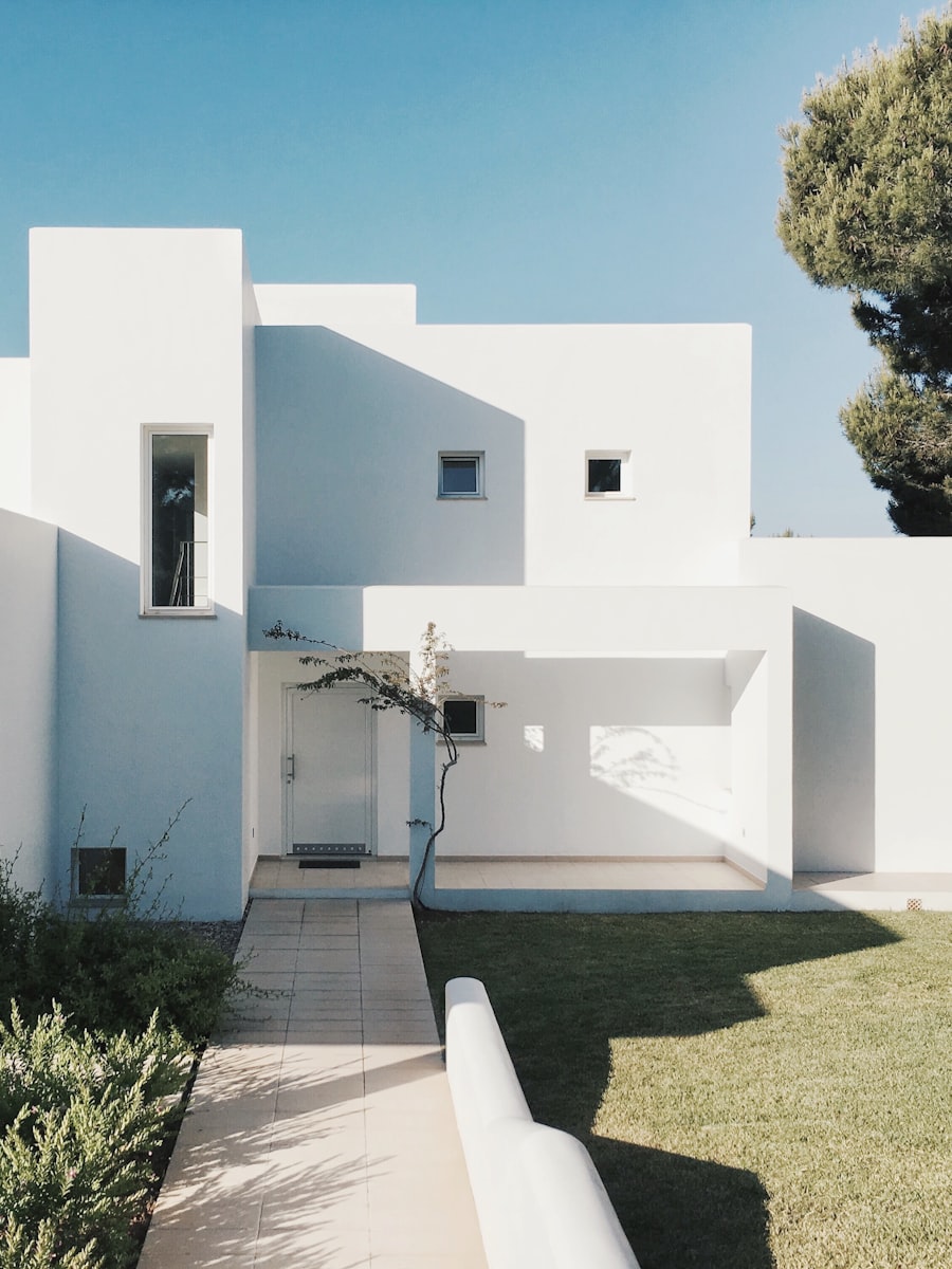 Mediterranean theme — whitewashed villa in strong coastal sun