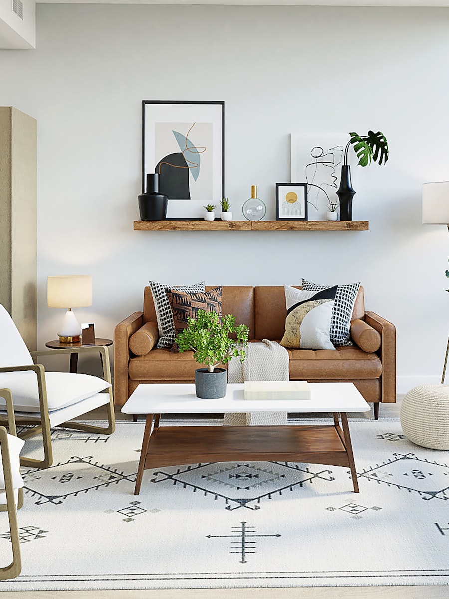 Scandinavian theme — light-filled living room with tan leather sofa